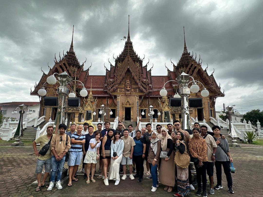 Team photo in front of a temple, 2023 Company Trip